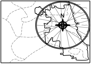 a bike wheel shaped compass on a map of chicago