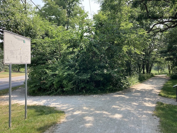 Next to trail map sign near intersection of Hobson Rd and Greene Rd