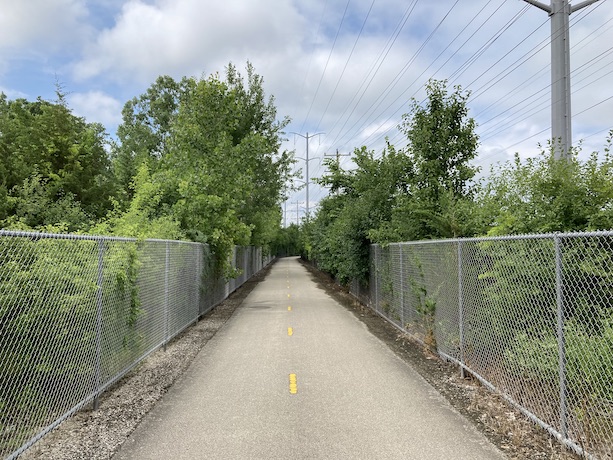 A portion of the trail with fence alongside